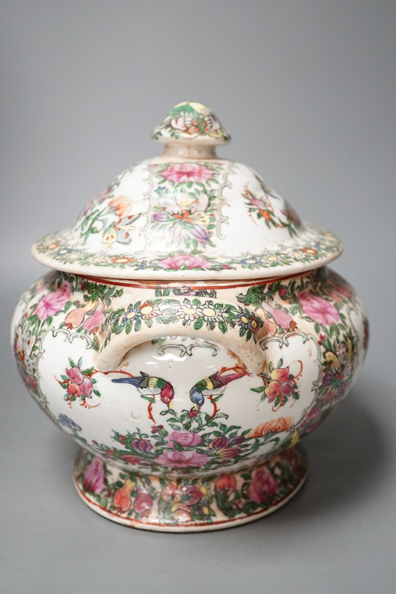 A large Chinese famille rose vase and a similar tureen and cover, vase 63 cms high.